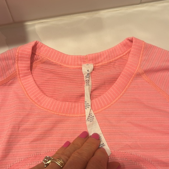 Lululemon swiftly tech in pinkish peach color. - Picture 2 of 4